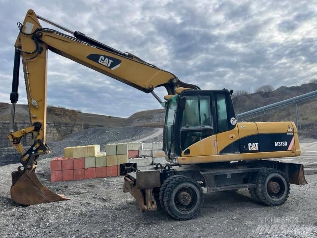 CAT M318D Kolová rýpadla