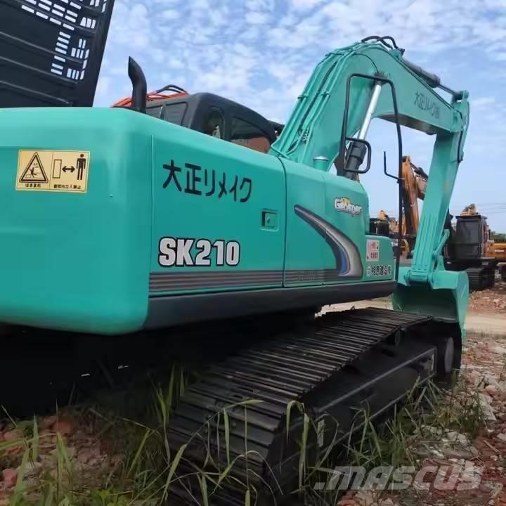 Kobelco SK 210 Pásová rýpadla