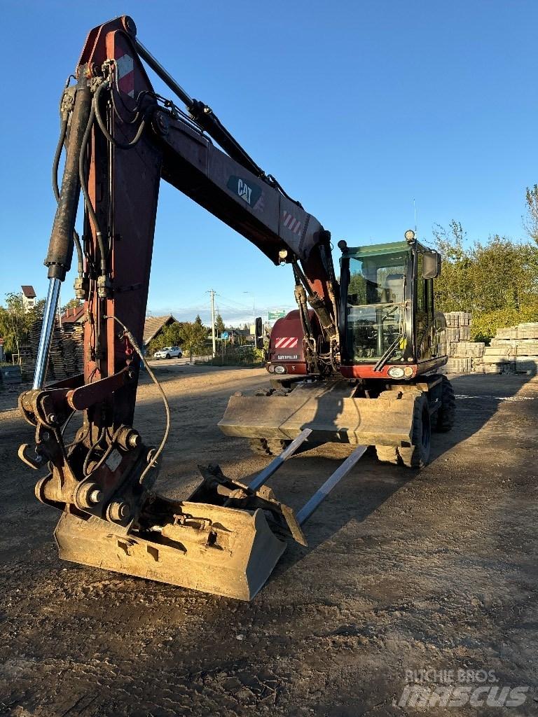 CAT 313 D Kolová rýpadla