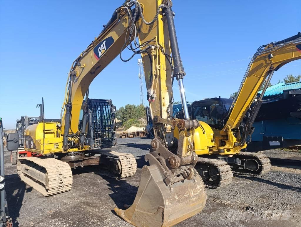 CAT 319D Pásová rýpadla