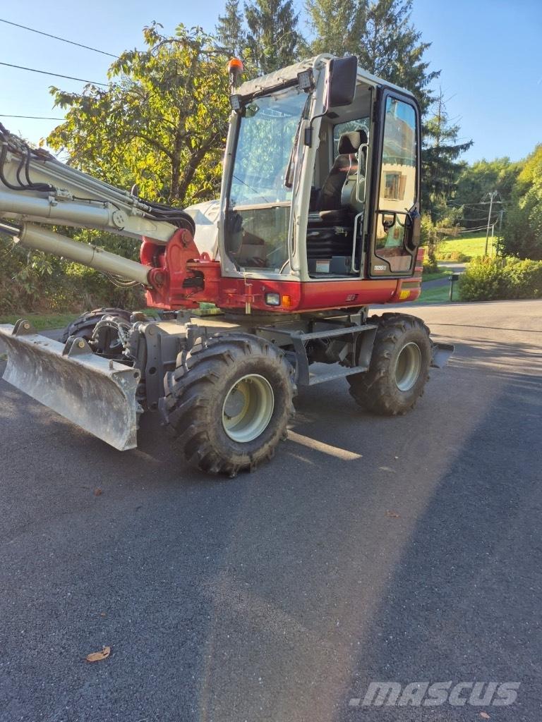 Takeuchi TB 295 W Kolová rýpadla