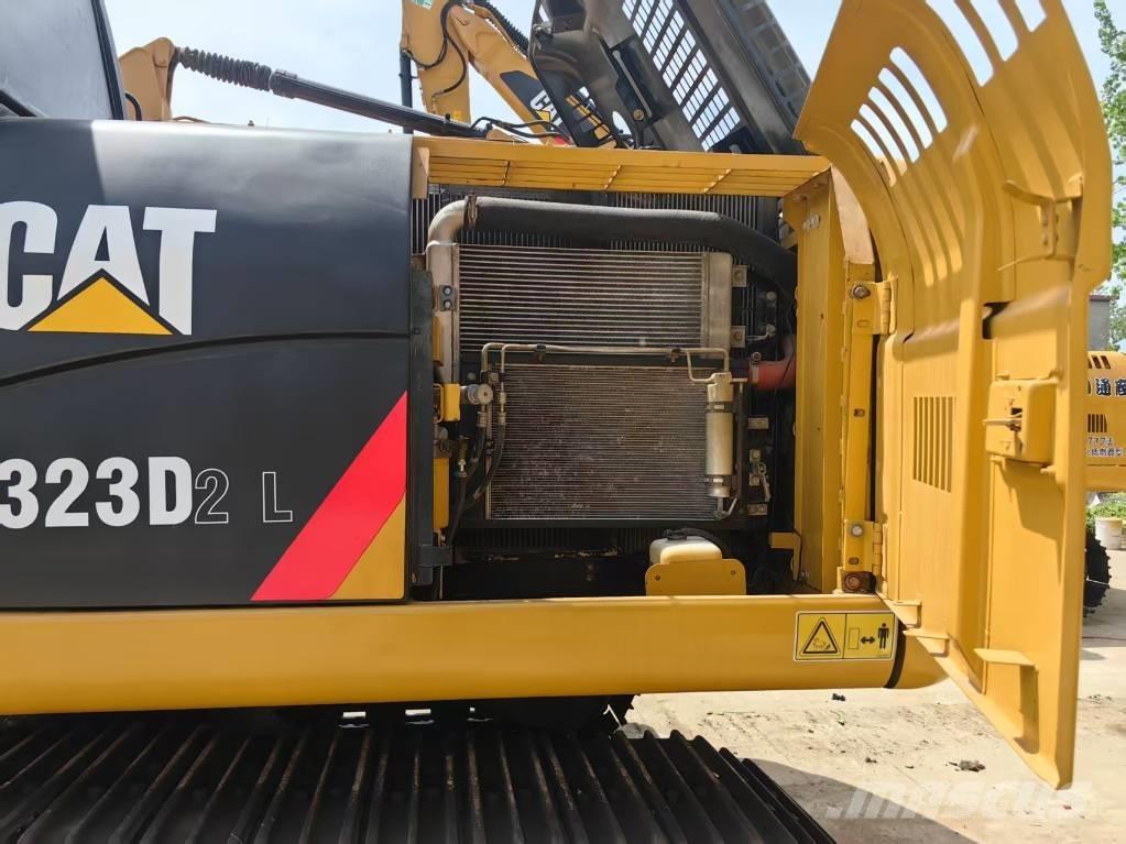 CAT 323 D Pásová rýpadla