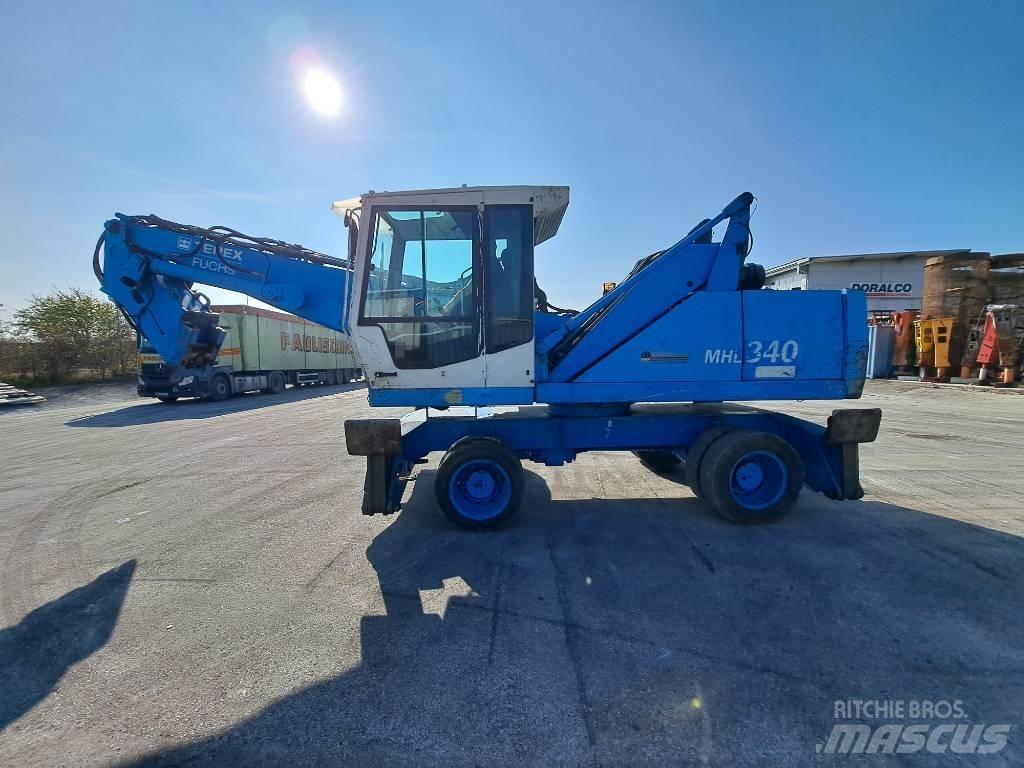 Fuchs MHL  340C FQC Stroje pro manipulaci s odpadem