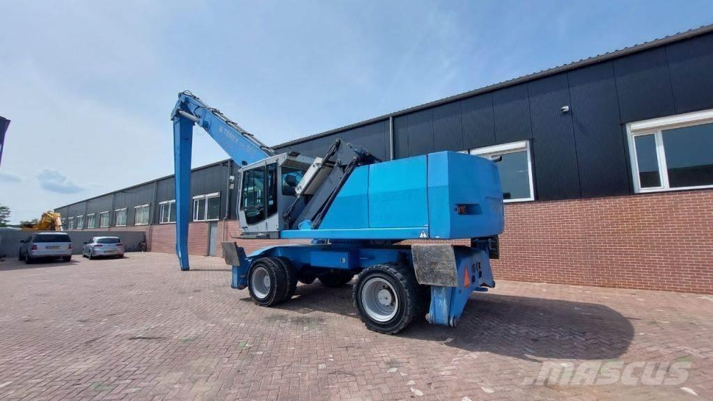 Fuchs MHL360 Stroje pro manipulaci s odpadem
