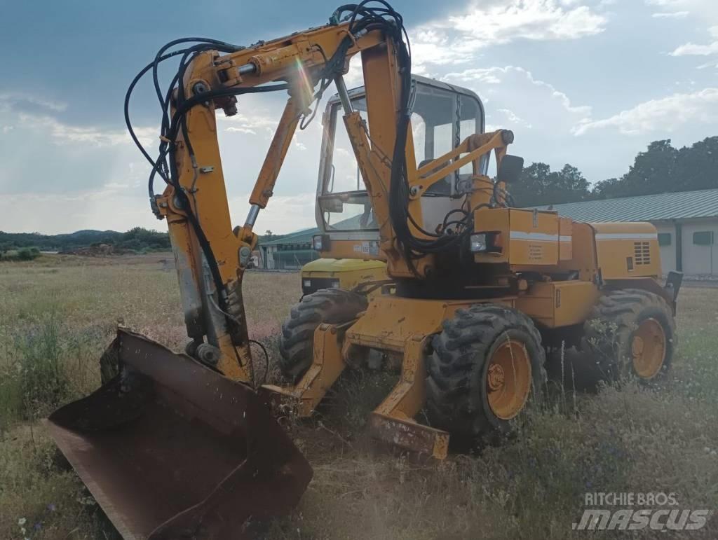 Mecalac 11 CX Kolová rýpadla