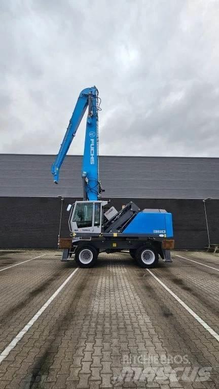 Fuchs MHL360 Stroje pro manipulaci s odpadem