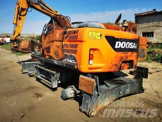 Doosan DX 140W track Pásy, řetězy a podvozek