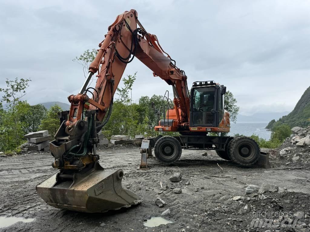 Doosan 140 W Kolová rýpadla