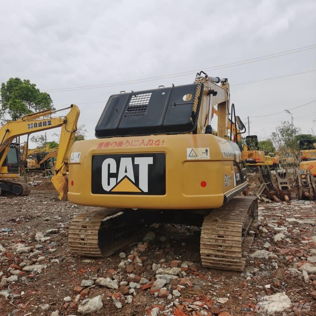 CAT 323DL Pásová rýpadla