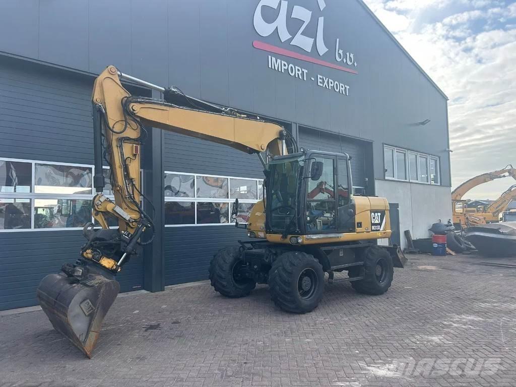 CAT M313D Kolová rýpadla