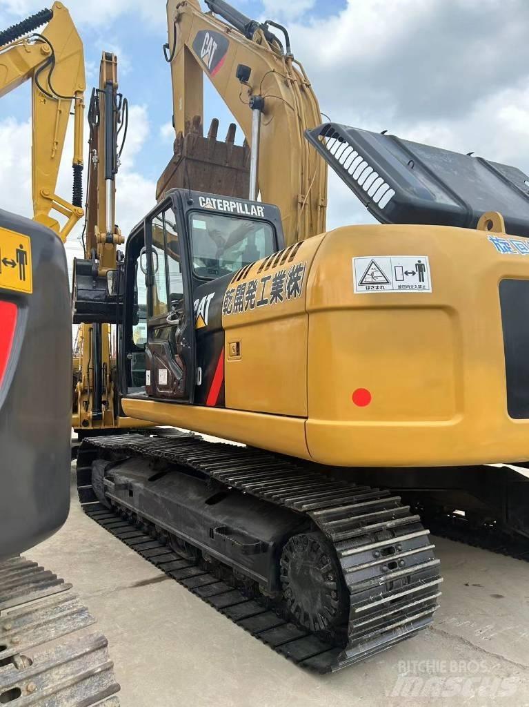 CAT CAT323D Pásová rýpadla