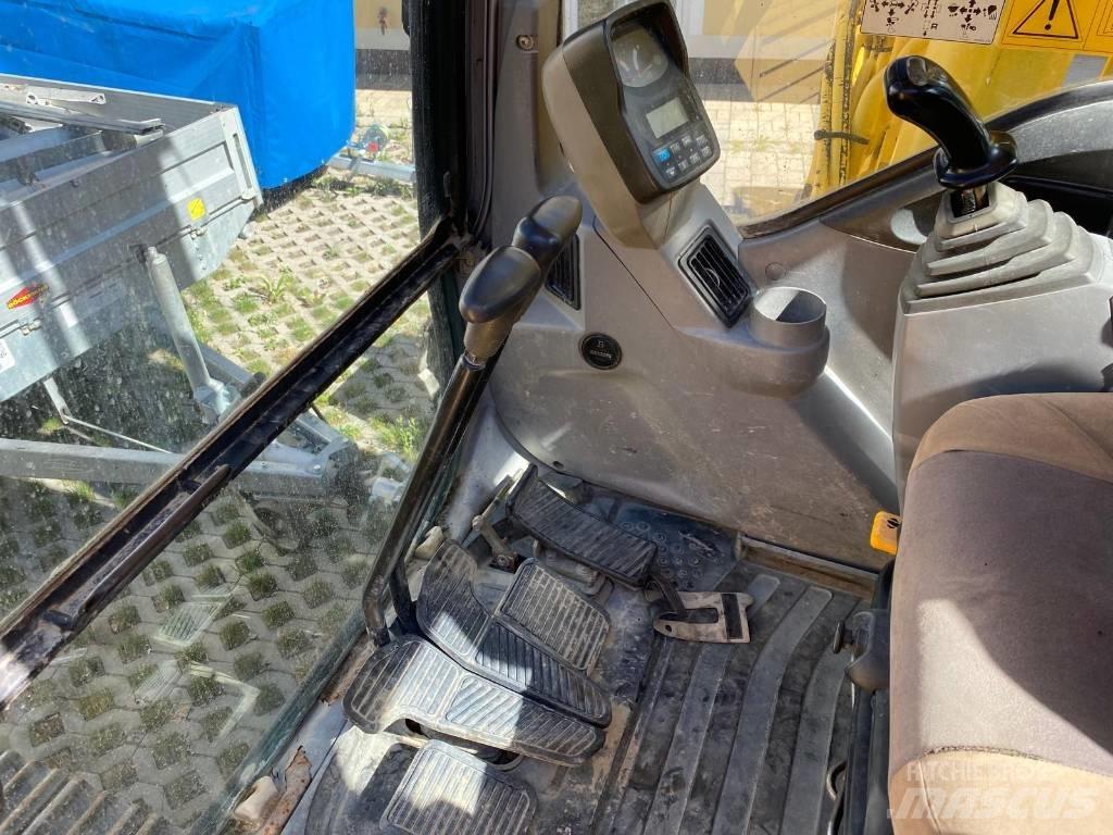 New Holland E 215 Pásová rýpadla