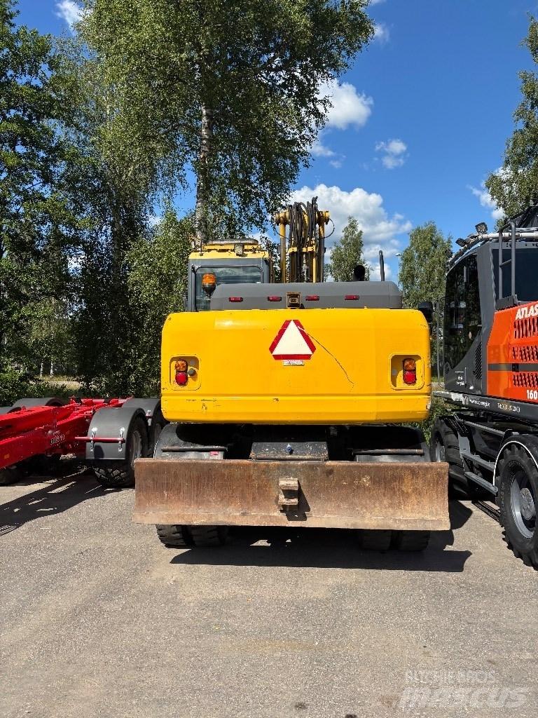 Komatsu PW 140-7 Kolová rýpadla