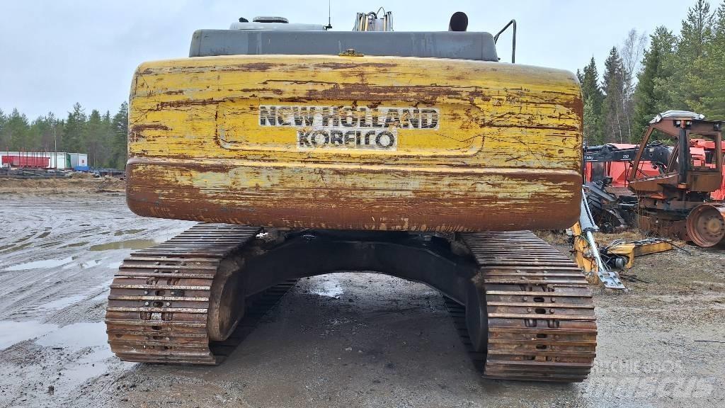New Holland E 305 Pásová rýpadla