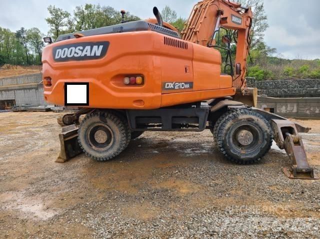 Doosan DX 210 W Kolová rýpadla