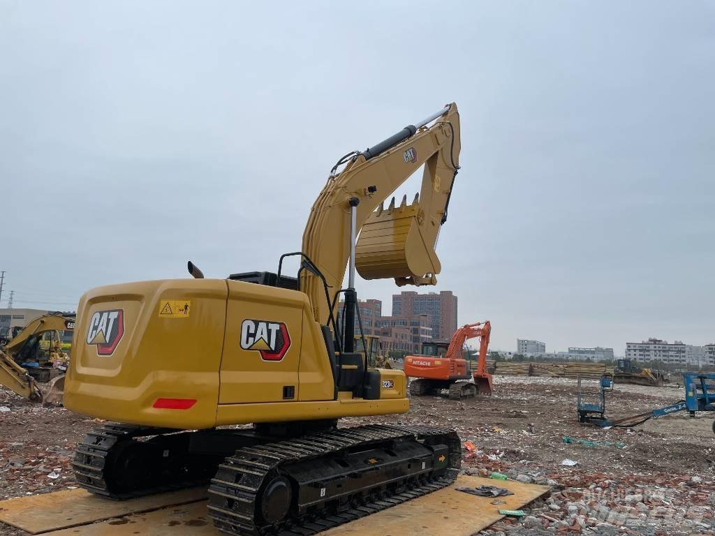 CAT 323GC Pásová rýpadla
