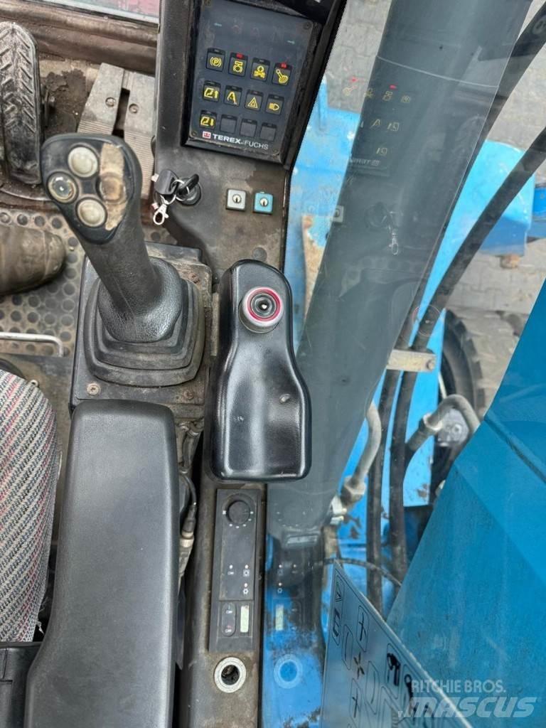 Fuchs MHL 320 Stroje pro manipulaci s odpadem