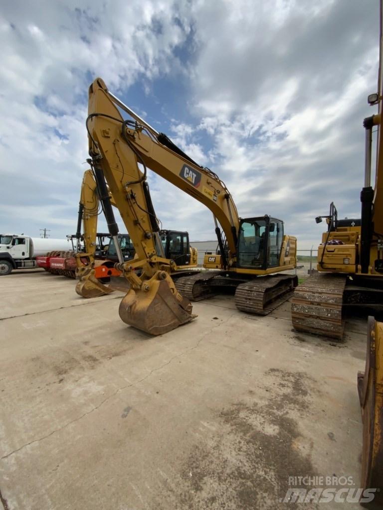 CAT 323 Pásová rýpadla