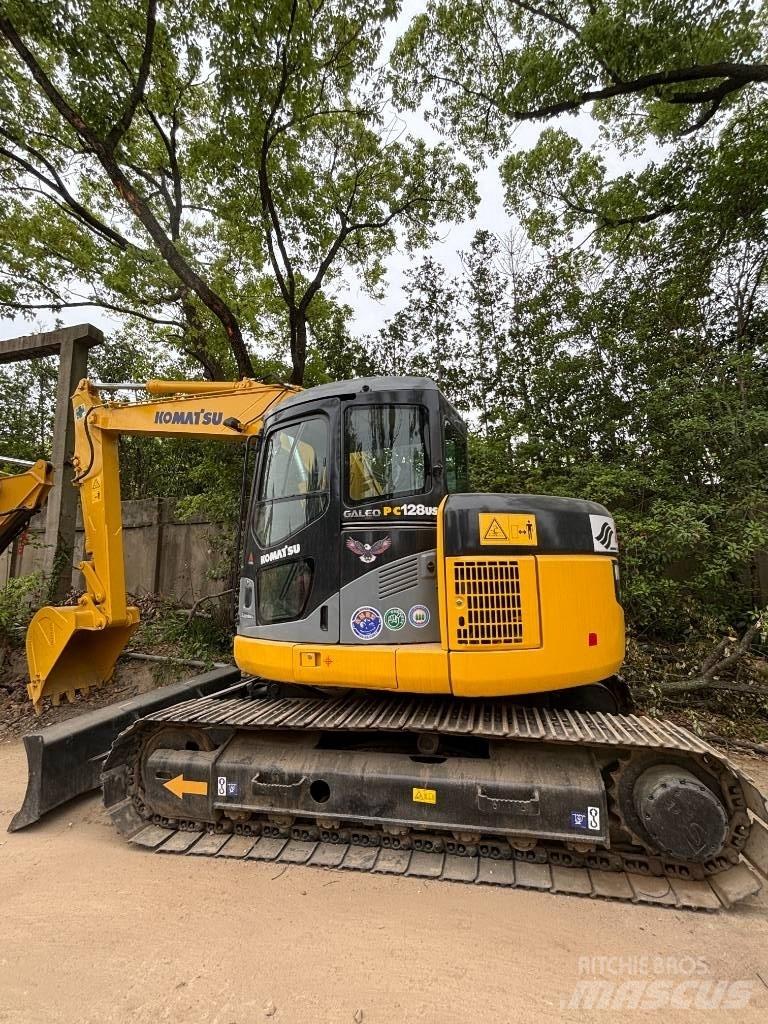 CAT pc 128us Midi rýpadla 7t - 12t