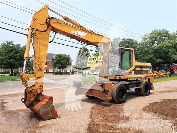 CAT M320 Kolová rýpadla