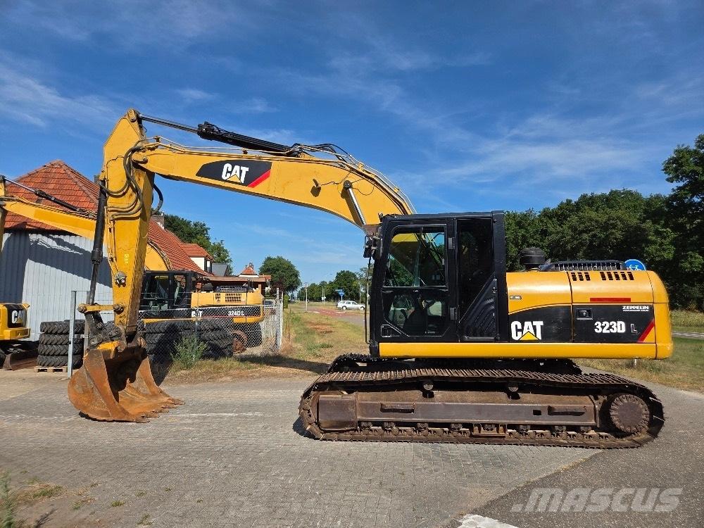 CAT 323DL Pásová rýpadla