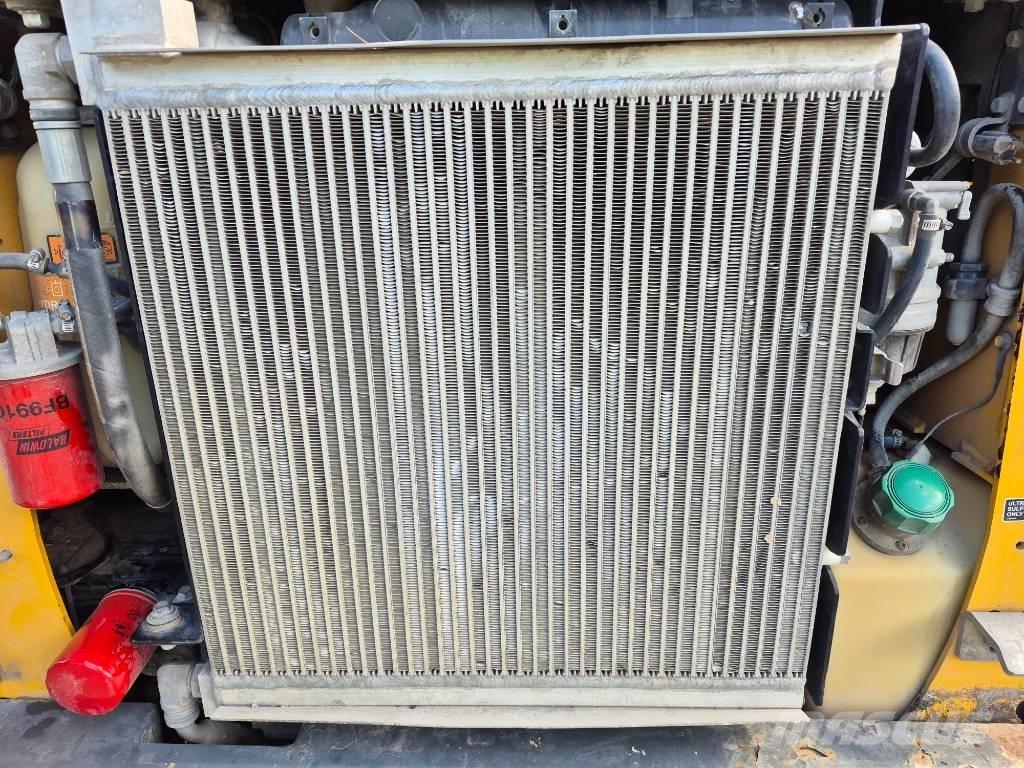 John Deere 316 Smykem řízené nakladače