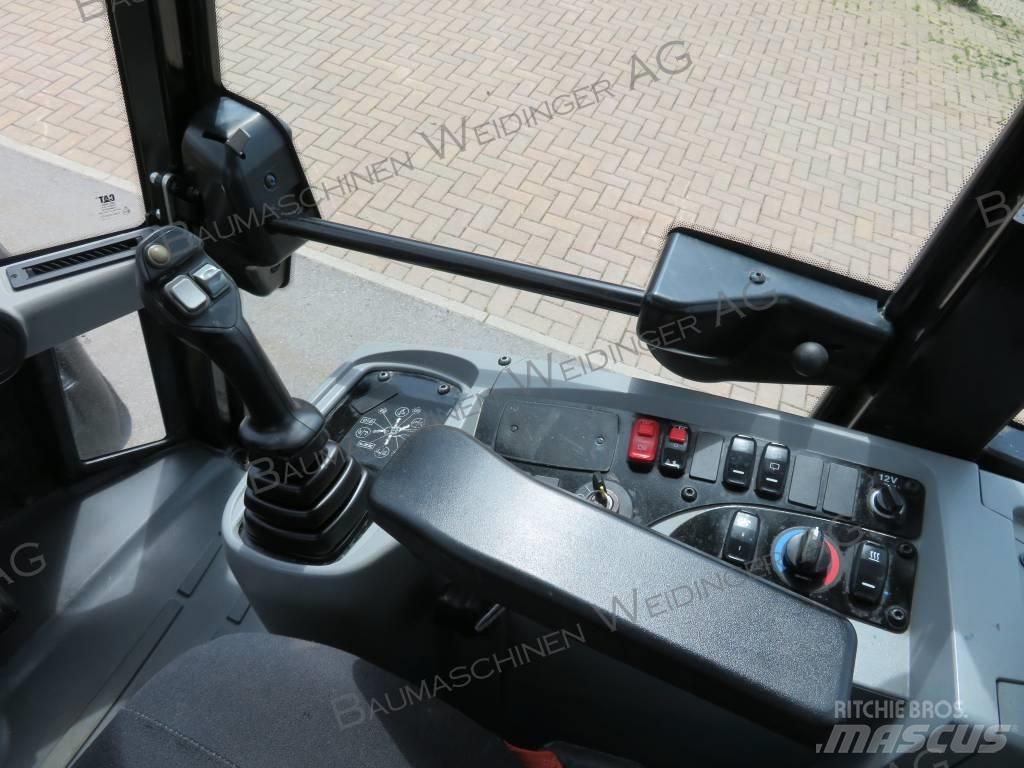 CAT 906M Kolové nakladače