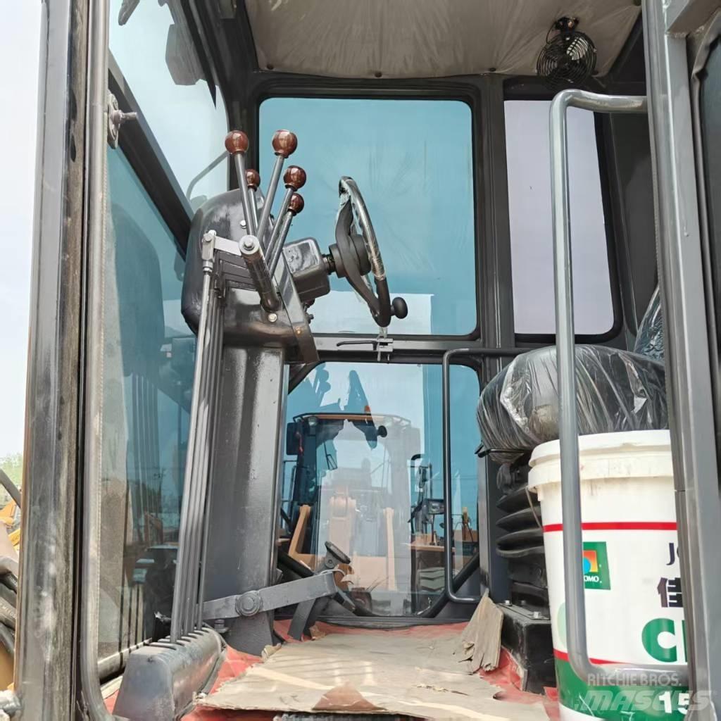 CAT 140 H Pásová rýpadla