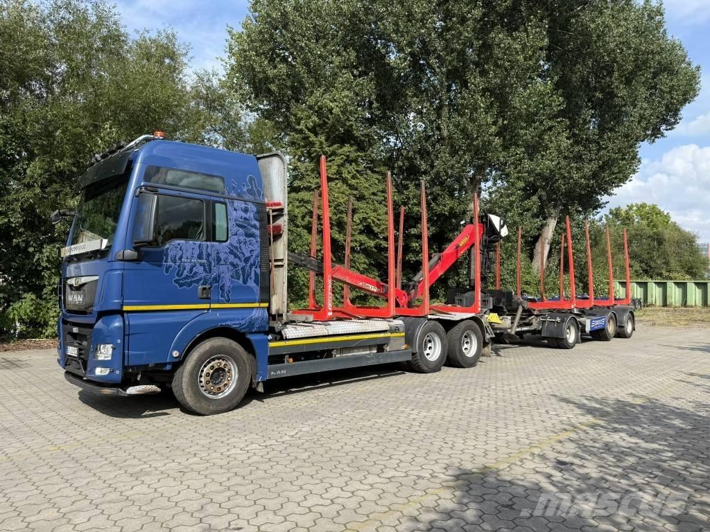 MAN TGX 33.500 Nákladní automobily pro přepravu lesních strojů