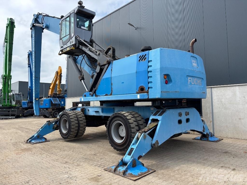 Fuchs MHL 380 Stroje pro manipulaci s odpadem