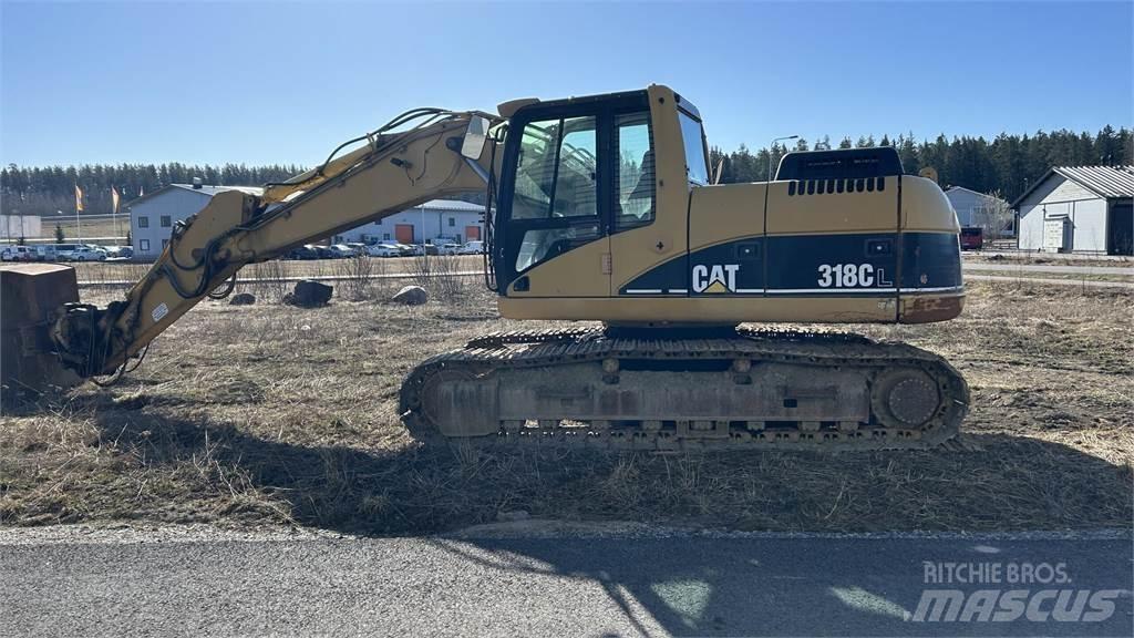 CAT 318 C Pásová rýpadla