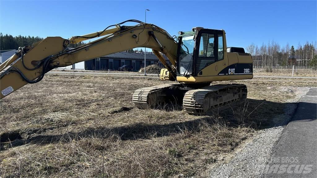 CAT 318 C Pásová rýpadla