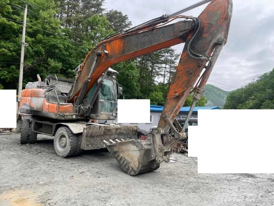 Doosan DX 210 W Kolová rýpadla