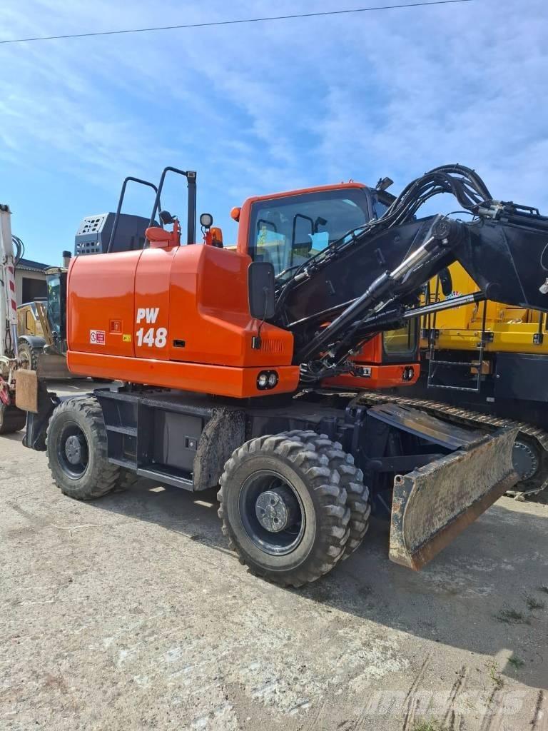 Komatsu PW 148-11 Kolová rýpadla