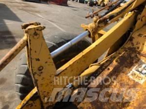 CAT 910 Kolové nakladače
