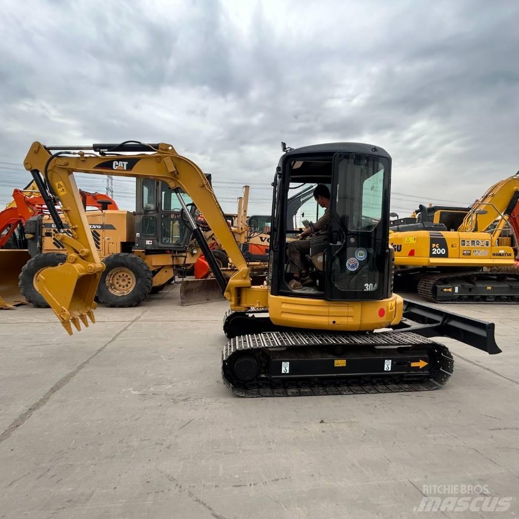 CAT 304 Pásová rýpadla