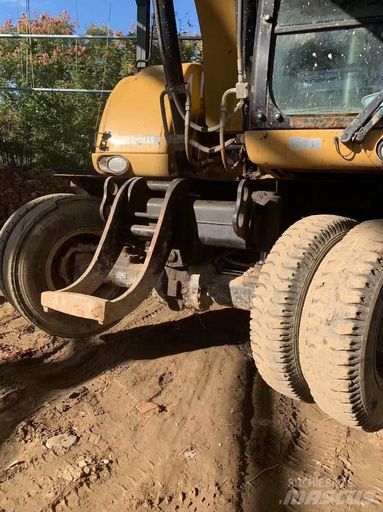 CAT 315 D Kolová rýpadla