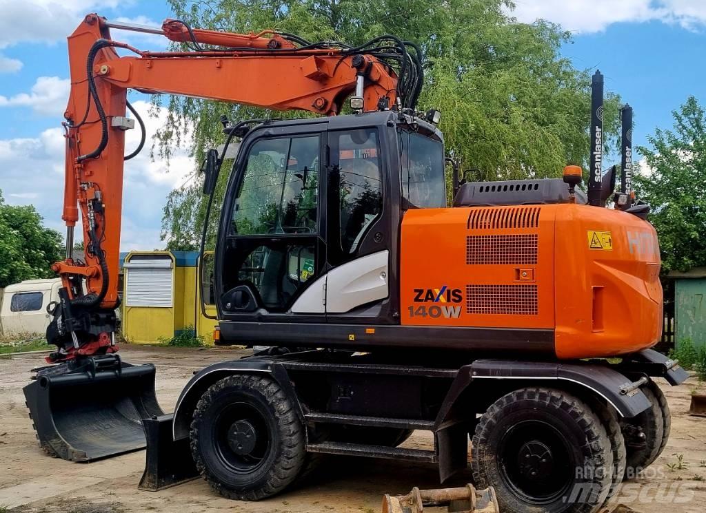 Hitachi 140W Kolová rýpadla