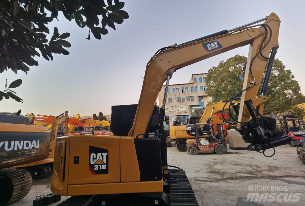 CAT 310 Pásová rýpadla