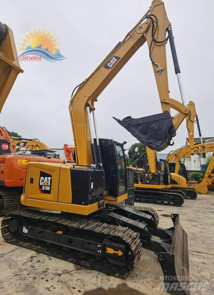 CAT 310 Pásová rýpadla