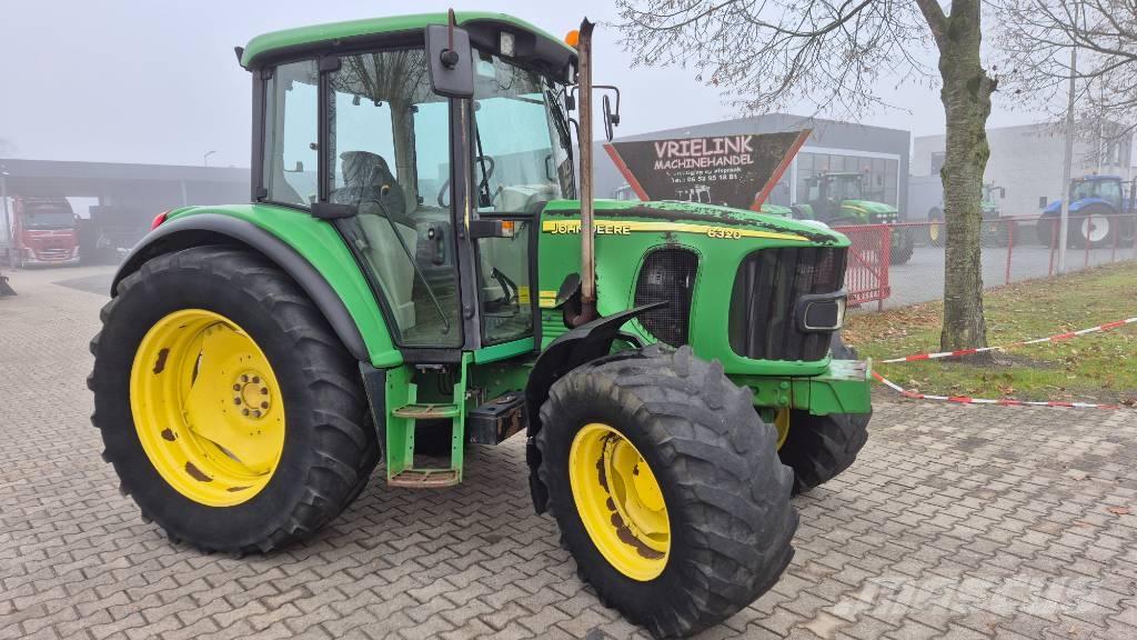 John Deere 6320 SE Traktory