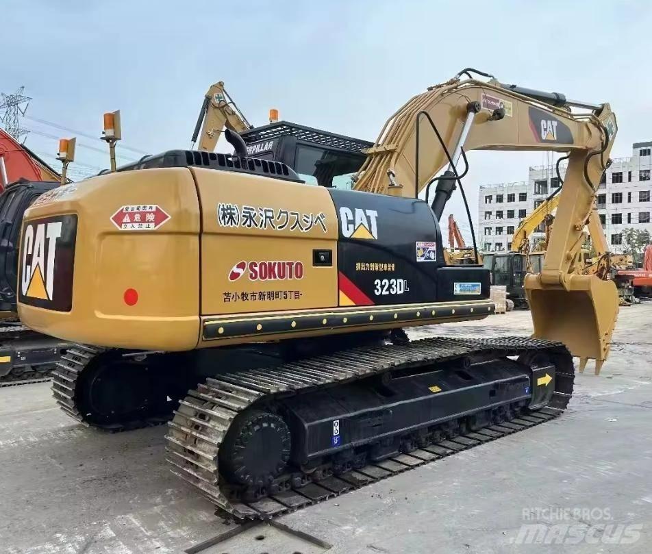 CAT 323 Pásová rýpadla