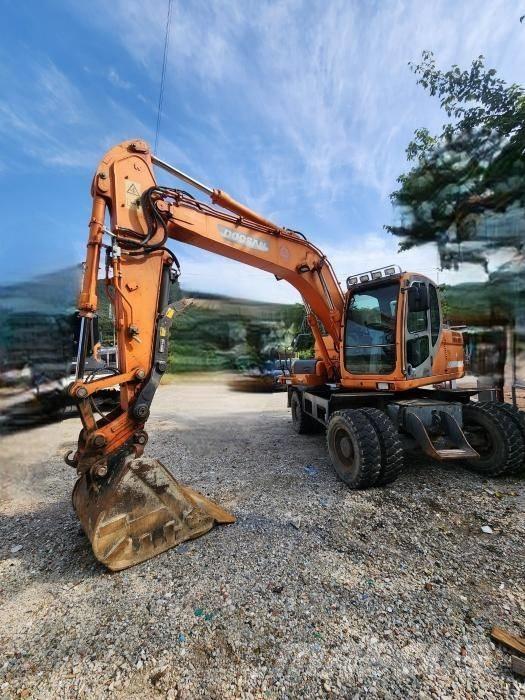 Doosan DX 140 W Kolová rýpadla