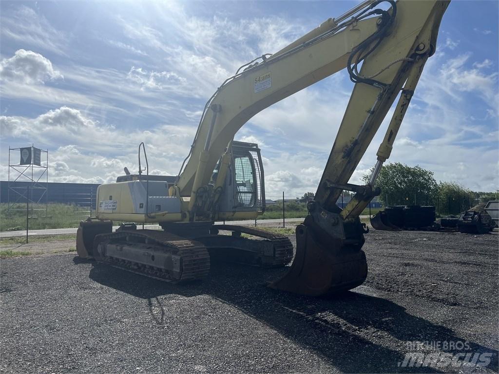 New Holland E 265 B Pásová rýpadla