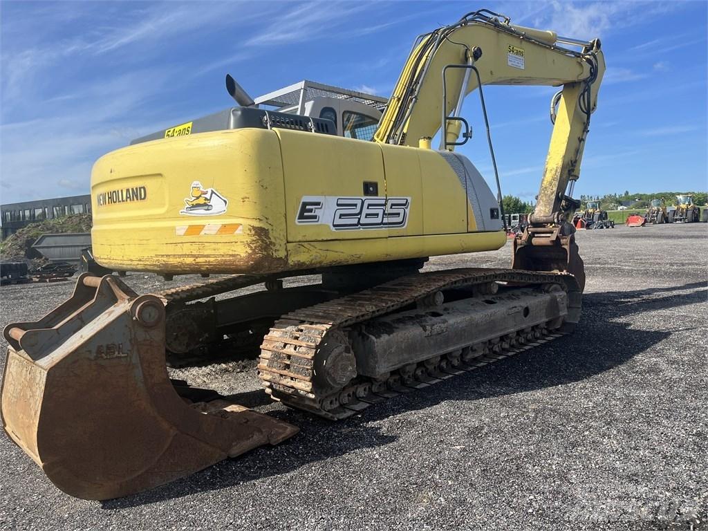 New Holland E 265 B Pásová rýpadla