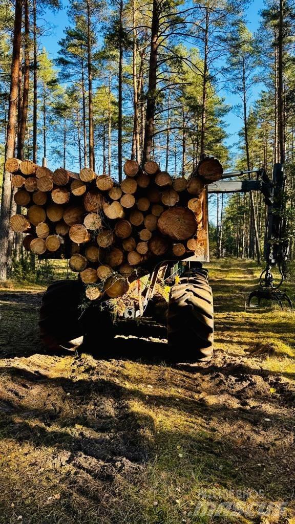 John Deere 1010G Vyvážecí traktory