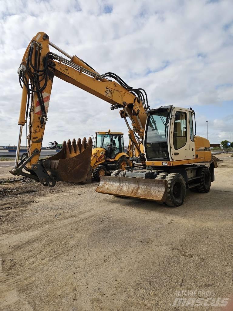 Liebherr 314 Kolová rýpadla