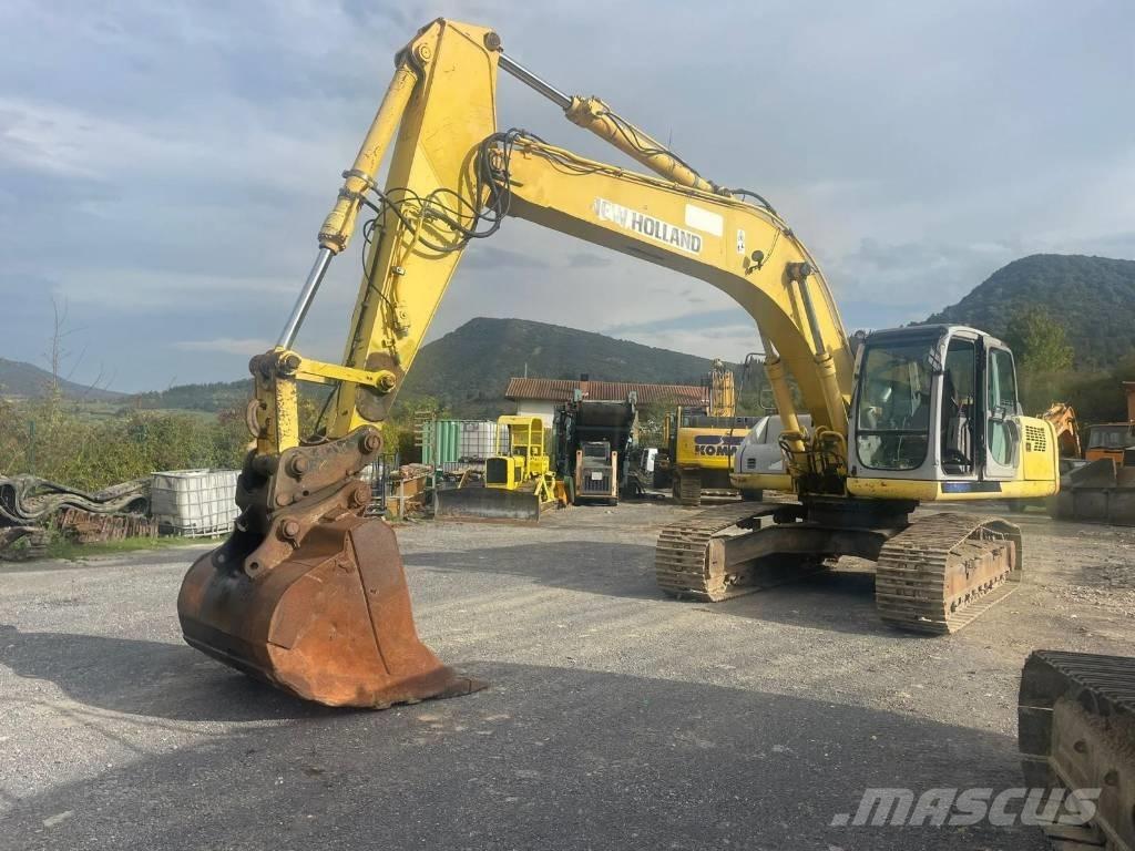 New Holland E 305 Pásová rýpadla