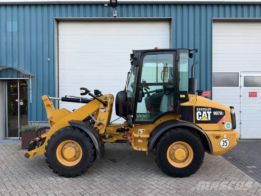 CAT 907 H Kolové nakladače