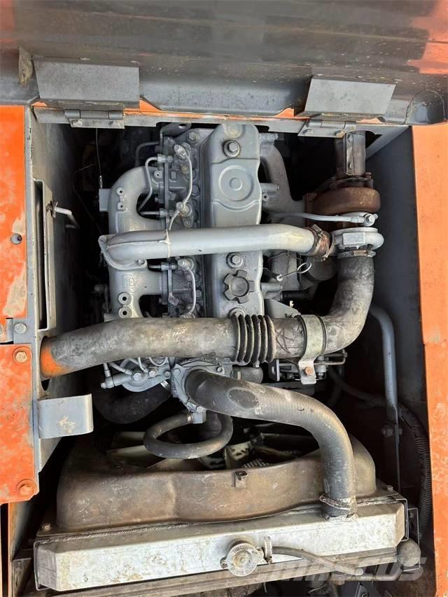 Hitachi EX120 Pásová rýpadla